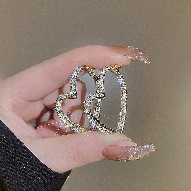 💎👂 50% RABATT! Funkelnde goldene Herzohrringe für Damen – Zeitlos romantisch & perfekt für besondere Momente ✨