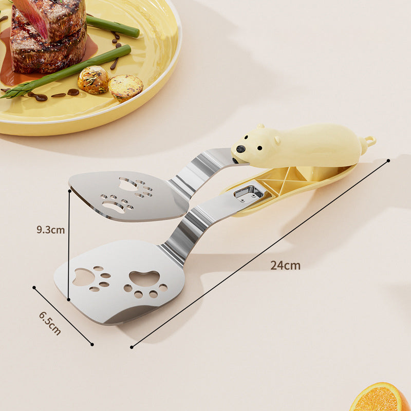 ✨✨2-in-1 Pfannenwender & Zange aus Edelstahl🥦☘️Mit Ölablauf für gesünderes Braten