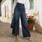 Asymmetrische Wickeljeans 👖 Eine Kombination aus Culottes und Hose, hochgeschnitten für optisch längere Beine, weit geschnitten und fließend, mit diagonal angeordneten Knöpfen – im Handumdrehen zur Fashionista! ✨