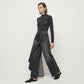 Asymmetrische Wickeljeans 👖 Eine Kombination aus Culottes und Hose, hochgeschnitten für optisch längere Beine, weit geschnitten und fließend, mit diagonal angeordneten Knöpfen – im Handumdrehen zur Fashionista! ✨