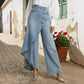 Asymmetrische Wickeljeans 👖 Eine Kombination aus Culottes und Hose, hochgeschnitten für optisch längere Beine, weit geschnitten und fließend, mit diagonal angeordneten Knöpfen – im Handumdrehen zur Fashionista! ✨