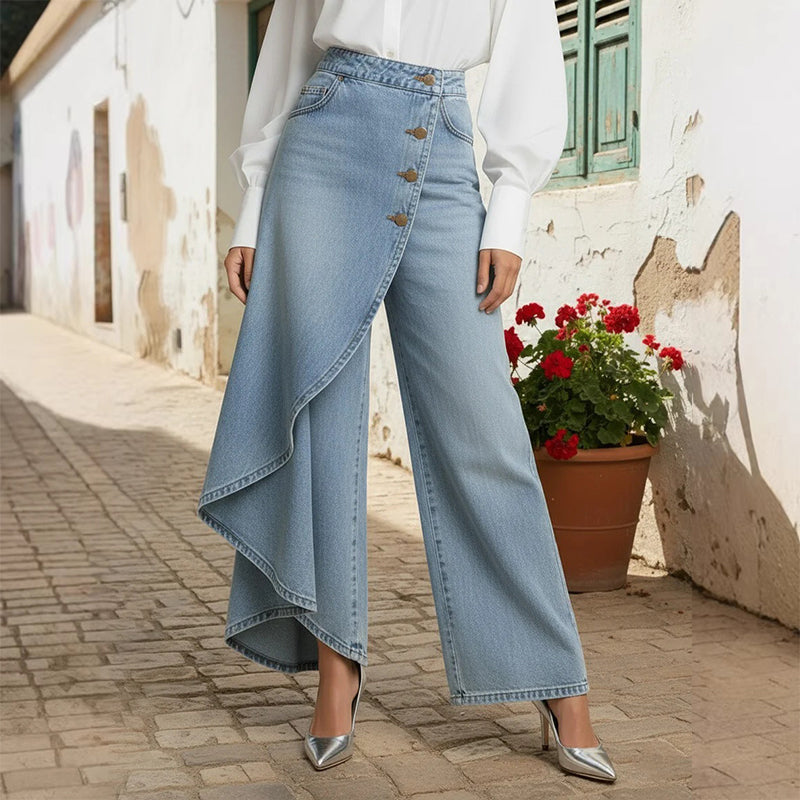 جينز ملفوف غير متماثل 👖 مزيج من السراويل الواسعة (Culottes) والسروال التقليدي، بخصر عالٍ لإبراز الأرجل بشكل أطول، فضفاض ومُتدفق، مع أزرار مُرتبة قطريًا – لتتحولي إلى أيقونة للموضة في لمح البصر! ✨