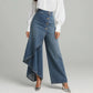 Asymmetrische Wickeljeans 👖 Eine Kombination aus Culottes und Hose, hochgeschnitten für optisch längere Beine, weit geschnitten und fließend, mit diagonal angeordneten Knöpfen – im Handumdrehen zur Fashionista! ✨