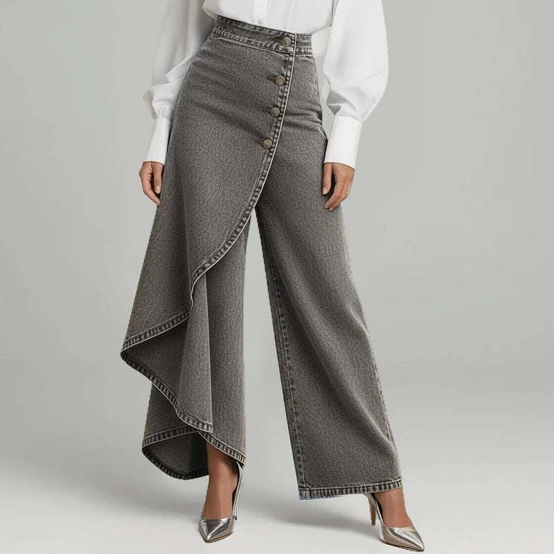 جينز ملفوف غير متماثل 👖 مزيج من السراويل الواسعة (Culottes) والسروال التقليدي، بخصر عالٍ لإبراز الأرجل بشكل أطول، فضفاض ومُتدفق، مع أزرار مُرتبة قطريًا – لتتحولي إلى أيقونة للموضة في لمح البصر! ✨