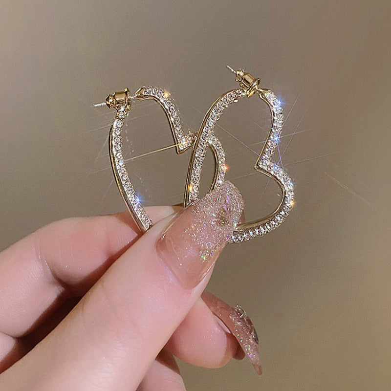 💎👂 50% RABATT! Funkelnde goldene Herzohrringe für Damen – Zeitlos romantisch & perfekt für besondere Momente ✨