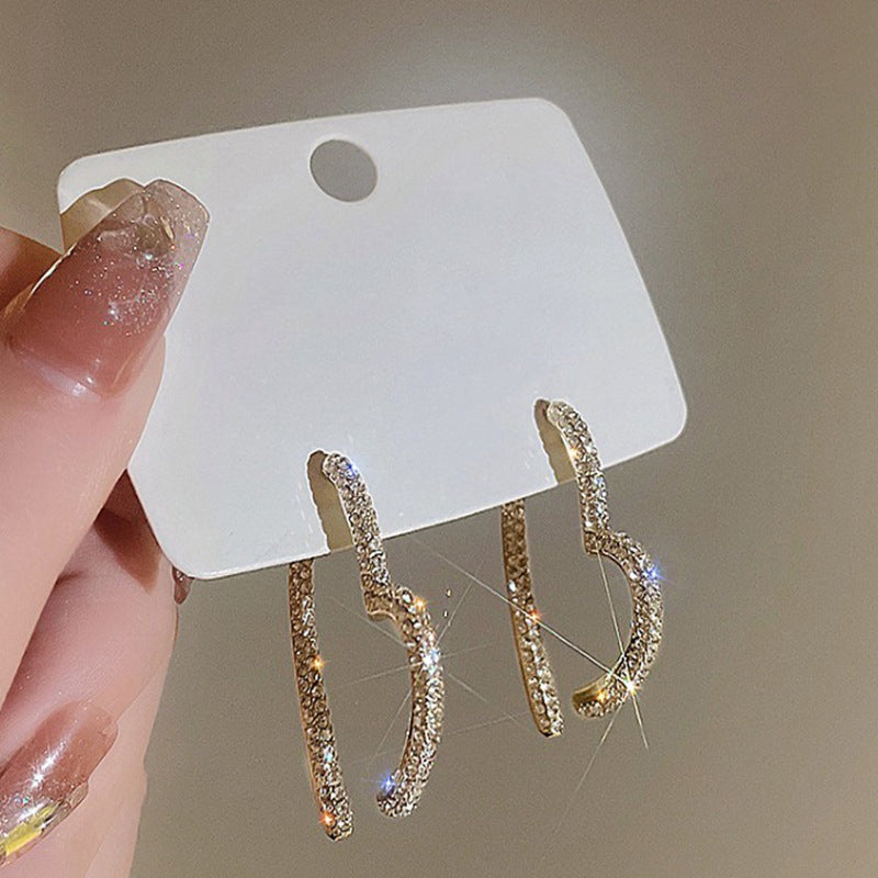💎👂 50% RABATT! Funkelnde goldene Herzohrringe für Damen – Zeitlos romantisch & perfekt für besondere Momente ✨