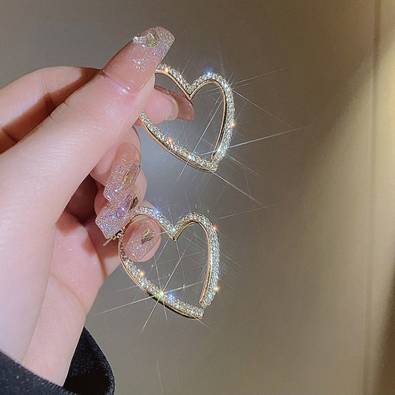 💎👂 50% RABATT! Funkelnde goldene Herzohrringe für Damen – Zeitlos romantisch & perfekt für besondere Momente ✨