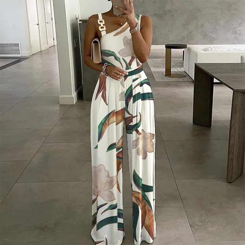 👖🌸 Jumpsuit mit asymmetrischem Schnallenriemen und Blumenmuster – 50% RABATT! Modern, feminin & perfekt für Sommer, Date oder festliche Anlässe ✨