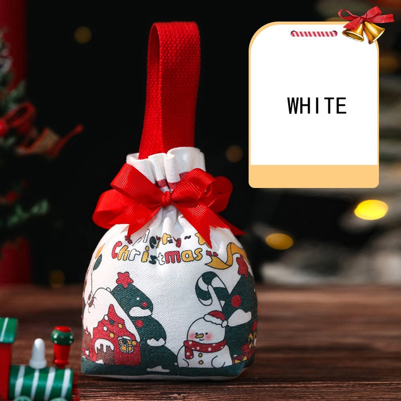 Jute-Weihnachtstasche mit Apfelband und Süßigkeiten